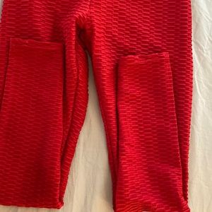 Womens red leggings sizes Large.